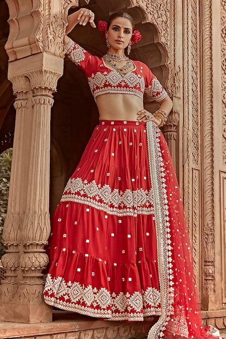 Photo of Red and gold bridal lehenga with mirror work