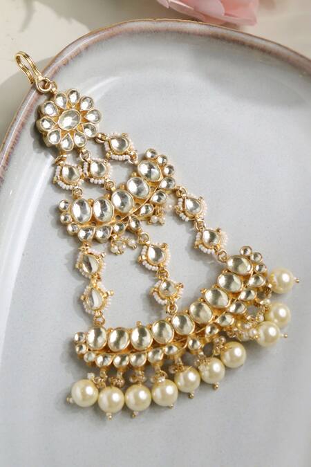 Shop Curio Cottage Gold Plated Kundan And Pearls Embellished Passa at Aza Fashions Shop_Curio Cottage_Gold Plated Kundan And Pearls Embellished Passa_at_Aza_Fashions