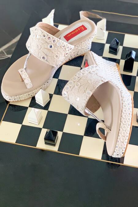Shop Essemm White Embroidered Martha Mirror Wedges at Aza Fashions Shop_Essemm_White Embroidered Martha Mirror Wedges_at_Aza_Fashions
