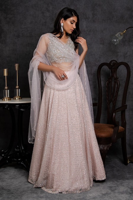 Shop Sunita Bhandari Pink Viscose, Georgette, Net Cut Work, Sequins V-neck Embroidered Lehenga Set at Aza Fashions Shop_Sunita Bhandari_Pink Viscose, Georgette, Net Cut Work, Sequins V-neck Embroidered Lehenga Set _at_Aza_Fashions
