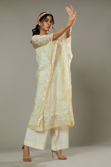 Buy I Am Design Ivory Silk Organza Floral Appliques, Sequins French Vanilla Kaftan And Pant Set Online at Aza Fashions Buy_I Am Design_Ivory Silk Organza Floral Appliques, Sequins French Vanilla Kaftan And Pant Set _Online_at_Aza_Fashions