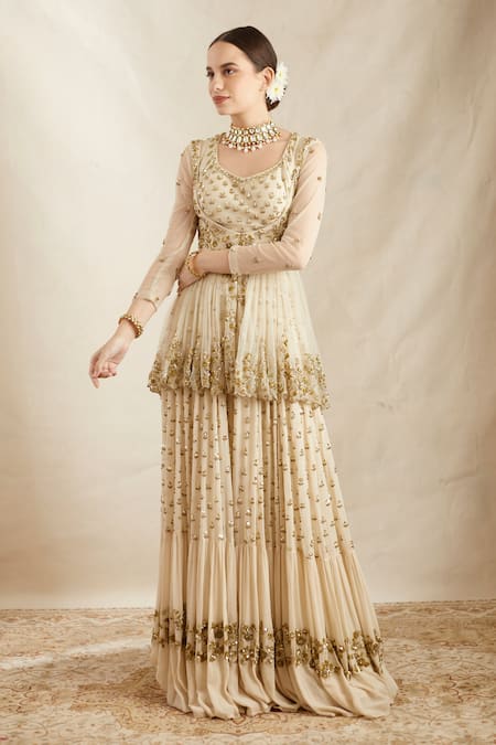 Astha Narang_Off White Net, Georgette Sequins, Floral Embroidered Peplum Jacket Sharara Set _Online_at_Aza_Fashions