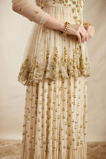 Buy_Astha Narang_Off White Net, Georgette Sequins, Floral Embroidered Peplum Jacket Sharara Set _Online_at_Aza_Fashions