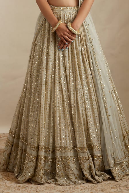 Astha Narang Green Chanderi Silk Sequins V-neck Sitara Embroidered Bridal Lehenga Set at Aza Fashions Astha Narang_Green Chanderi Silk Sequins V-neck Sitara Embroidered Bridal Lehenga Set _at_Aza_Fashions