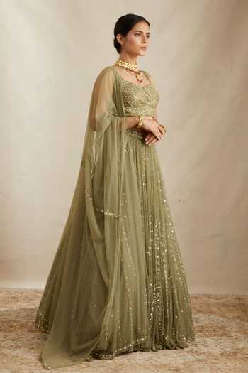 Shop ASTHA NARANG Green Net, Crepe, Nylon Embroidery, Sequins V-neck Botanic Bridal Lehenga Set Online at Aza Fashions Shop_ASTHA NARANG_Green Net, Crepe, Nylon Embroidery, Sequins V-neck Botanic Bridal Lehenga Set _Online_at_Aza_Fashions