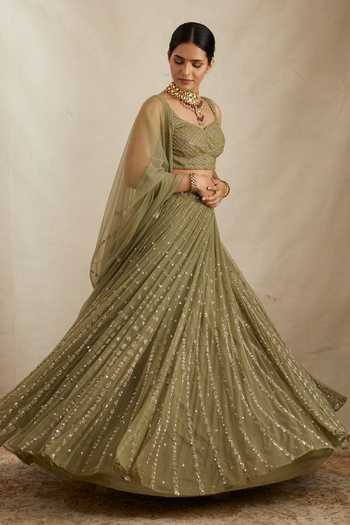 ASTHA NARANG Green Net, Crepe, Nylon Embroidery, Sequins V-neck Botanic Bridal Lehenga Set at Aza Fashions ASTHA NARANG_Green Net, Crepe, Nylon Embroidery, Sequins V-neck Botanic Bridal Lehenga Set _at_Aza_Fashions