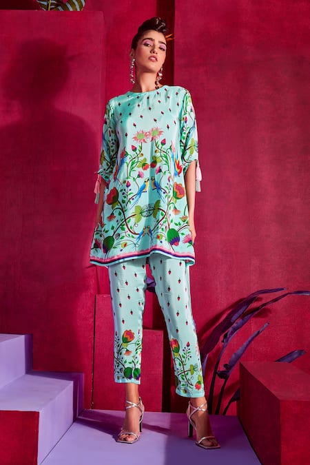 Shop Limerick By Abirr N' Nanki Blue Crepe Floral Print Betsy Pencil Pants at Aza Fashions Shop_Limerick By Abirr N' Nanki_Blue Crepe Floral Print Betsy Pencil Pants _at_Aza_Fashions