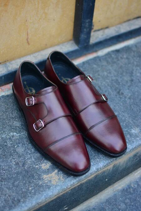 Shop Oblum Maroon Handcrafted Double Monk Strap Shoes at Aza Fashions Shop_Oblum_Maroon Handcrafted Double Monk Strap Shoes_at_Aza_Fashions