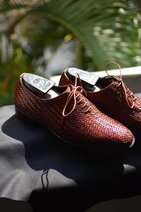 Woven leather slippers hot sale