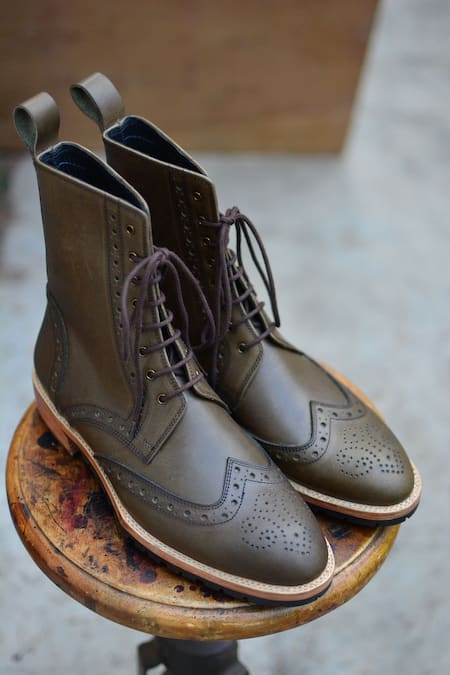 Oblum_Brown Handcrafted Eyelet Brogued Boots_Online_at_Aza_Fashions