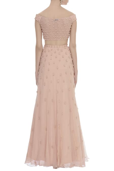 Shop Arpan Vohra Peach Sequin Work One Shoulder Floral Butti Embroidered Lehenga Set at Aza Fashions Shop_Arpan Vohra_Peach Sequin Work One Shoulder Floral Butti Embroidered Lehenga Set _at_Aza_Fashions