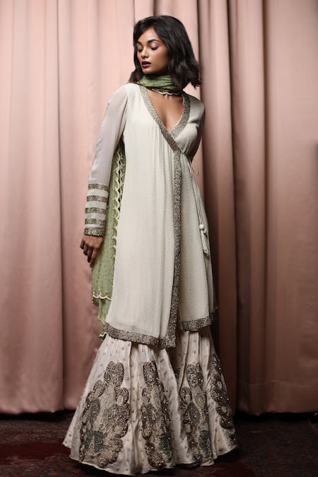 Shop Nandita Thirani White Chiffon, Georgette V Neck Embellished Angarkha Kurta And Sharara Set at Aza Fashions Shop_Nandita Thirani_White Chiffon, Georgette V Neck Embellished Angarkha Kurta And Sharara Set _at_Aza_Fashions