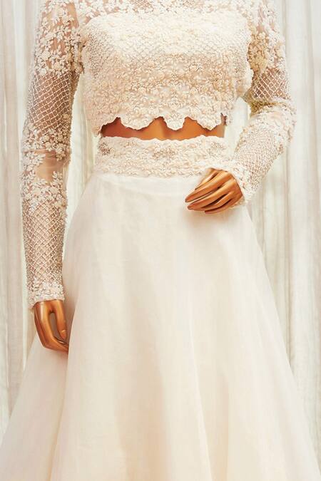 Shop COUTURE BY NIHARIKA White Embroidered Blouse And Lehenga Set Online at Aza Fashions Shop_COUTURE BY NIHARIKA_White Embroidered Blouse And Lehenga Set_Online_at_Aza_Fashions