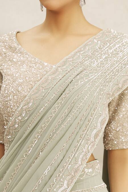 Varun Nidhika_Green Scallop Embroidered Lehenga Saree Set_at_Aza_Fashions