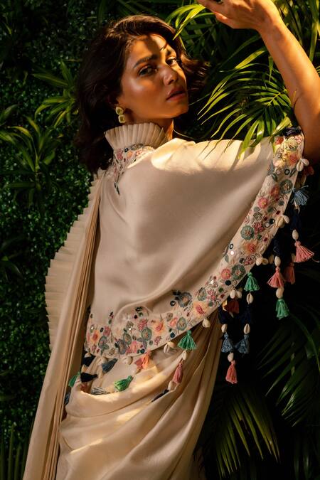 Shop Pallavi Poddar Ivory Organza, Denim Tassels Daffodil Pre-draped Saree With Embroidered Cape Online at Aza Fashions Shop_Pallavi Poddar_Ivory Organza, Denim Tassels Daffodil Pre-draped Saree With Embroidered Cape _Online_at_Aza_Fashions
