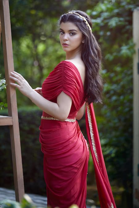 Mandira Wirk - Indian Red Chiffon Wide Neck Pre-draped Sharara Pant Saree Online at Aza Fashions Mandira Wirk - Indian_Red Chiffon Wide Neck Pre-draped Sharara Pant Saree _Online_at_Aza_Fashions