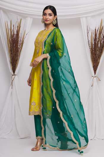 Surbhi Shah_Yellow Spun Silk Floral Motifs Round Embroidered Kurta Set_Online_at_Aza_Fashions