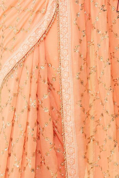 Romaa_Peach Petticoat Satin Lycra, Saree Chiffon Chikankari, Jaal With Blouse_at_Aza_Fashions