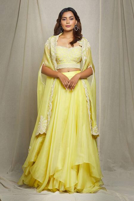 Buy Pink and yellow lehenga set by Anushree Reddy at Aashni and Co