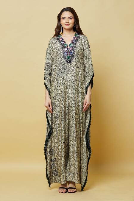 Nupur Kanoi_Off White Crepe Tassels, Mirrors V-neck Embroidered Neckline Jumpsuit_at_Aza_Fashions