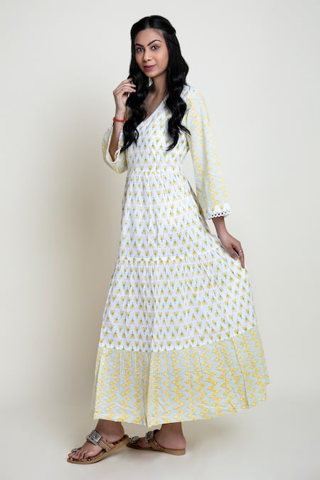 Buy Abbaran Yellow Cotton Cambric Block Print V Neck Floral Dress Online at Aza Fashions Buy_Abbaran_Yellow Cotton Cambric Block Print V Neck Floral Dress _Online_at_Aza_Fashions