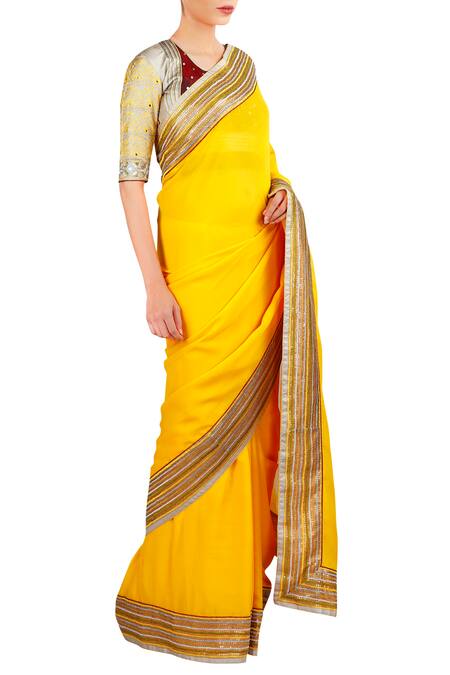 Latha Puttanna_Yellow Georgette Sequin, Thread Round Neck And Embroidered Saree With Blouse_Online_at_Aza_Fashions