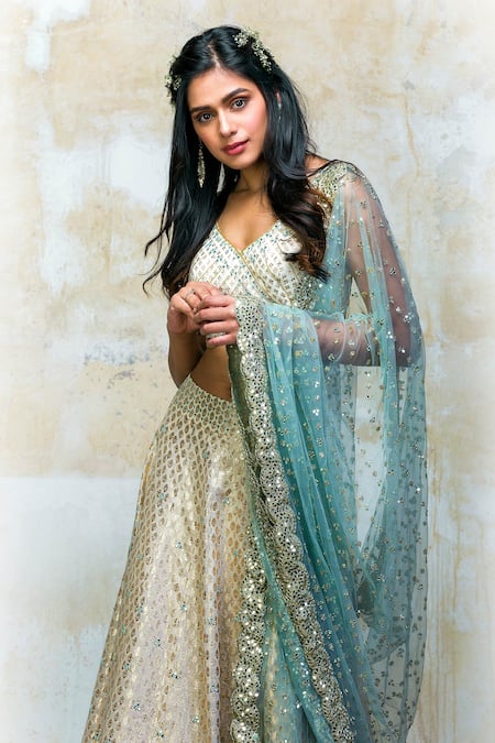 Shop Izzumi Mehta Blue Lehenga And Blouse Brocade Dupatta Net V Neck Embroidered Bridal Set at Aza Fashions Shop_Izzumi Mehta_Blue Lehenga And Blouse Brocade Dupatta Net V Neck Embroidered Bridal Set _at_Aza_Fashions