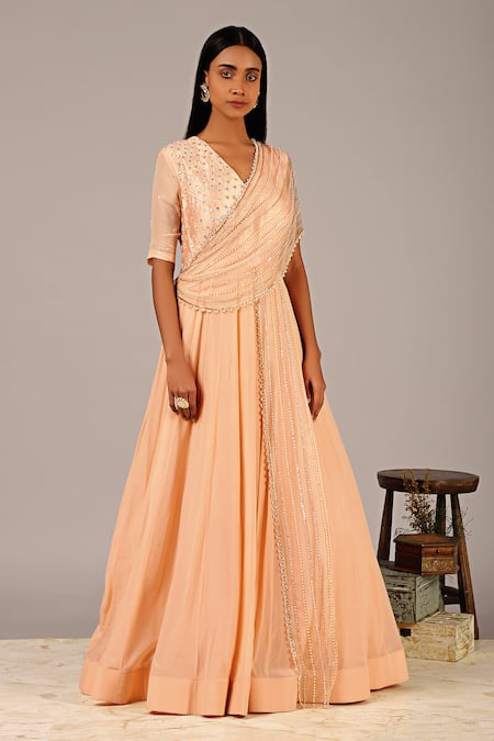 Nidhika Shekhar_Peach Organza Silk Lining Shantoon V Neck Draped Saree Gown _Online_at_Aza_Fashions
