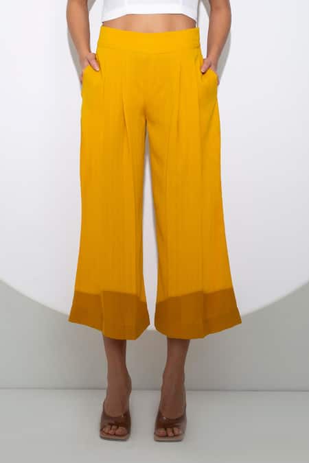 Buy_Pocketful Of Cherrie_Yellow Crepe Pleated Cropped Culottes_Online_at_Aza_Fashions