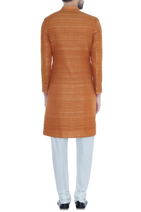 Khanijo Orange solid handloom silk achkan with printed lining 