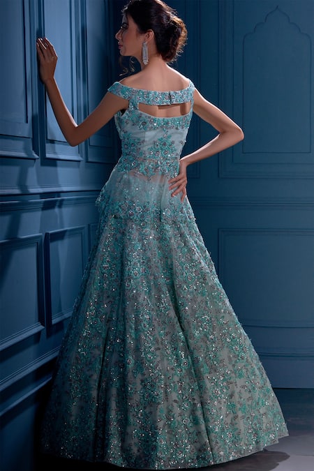 Shop Angad Singh Blue Net Interlining Satin V Neck Peplum Blouse And Lehenga Set at Aza Fashions Shop_Angad Singh_Blue Net Interlining Satin V Neck Peplum Blouse And Lehenga Set _at_Aza_Fashions