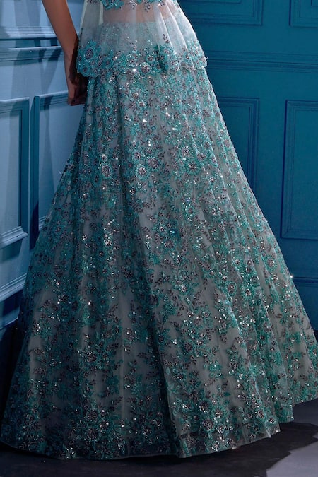 Shop Angad Singh Blue Net Interlining Satin V Neck Peplum Blouse And Lehenga Set Online at Aza Fashions Shop_Angad Singh_Blue Net Interlining Satin V Neck Peplum Blouse And Lehenga Set _Online_at_Aza_Fashions