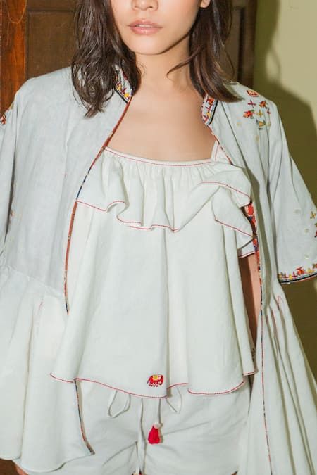 Shop Nikasha White Cotton Band Collar Peplum Jacket at Aza Fashions Shop_Nikasha_White Cotton Band Collar Peplum Jacket _at_Aza_Fashions