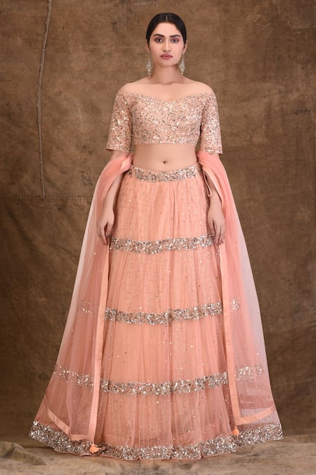 Shop_Aariyana Couture_Pink Silk, Net Sequins, Tassels One Shoulder Embellished Lehenga Set_Online_at_Aza_Fashions