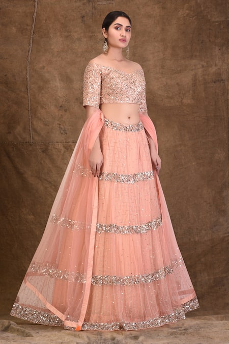 Aariyana Couture_Pink Silk, Net Sequins, Tassels One Shoulder Embellished Lehenga Set_Online_at_Aza_Fashions