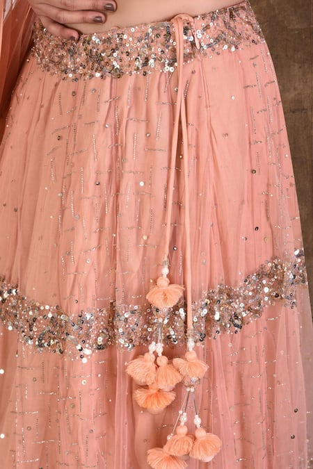 Aariyana Couture_Pink Silk, Net Sequins, Tassels One Shoulder Embellished Lehenga Set_at_Aza_Fashions