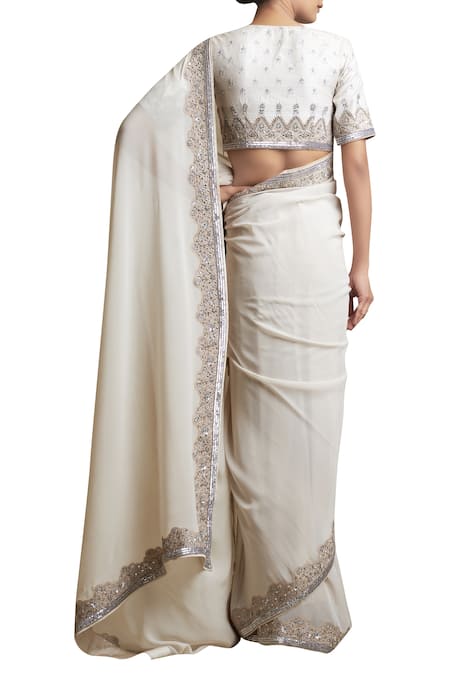 Shop_Sue Mue_Off White Raw Silk And Georgette Pearl Saree With Embellished Border And Blouse _at_Aza_Fashions