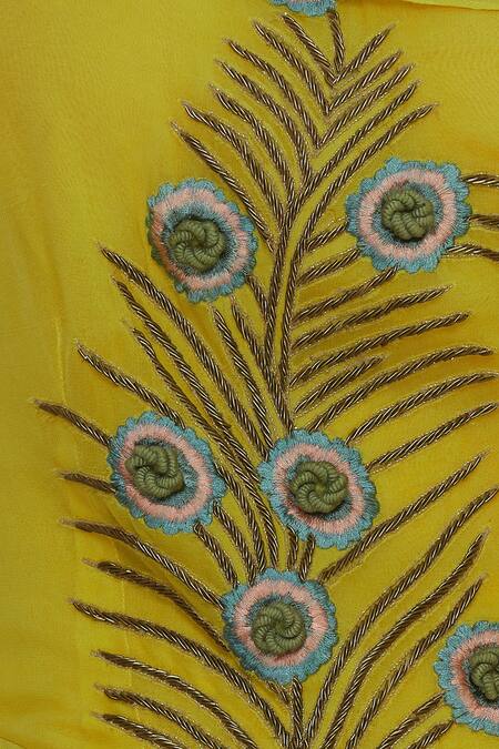 Ridhi Arora_Yellow Peplum Attached Draped Blouse With Pleated Lehenga_at_Aza_Fashions