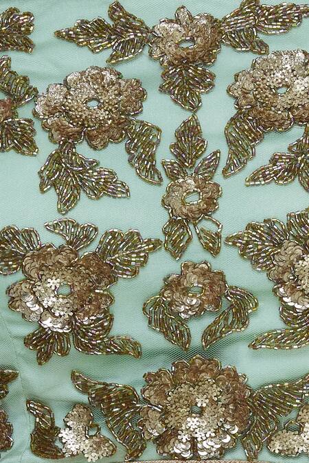 Vandana Sethi_Green Net Embroidered Off Shoulder Sequin And Zardozi Lehenga Set_at_Aza_Fashions