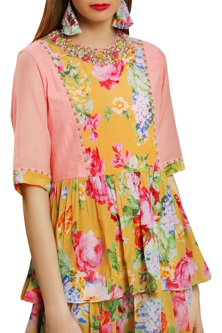 Nikasha Yellow Closed Round Neck Printed Floral Peplum Top With Dhoti Pants Online at Aza Fashions Nikasha_Yellow Closed Round Neck Printed Floral Peplum Top With Dhoti Pants _Online_at_Aza_Fashions