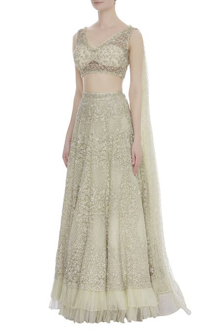 Buy_COUTURE BY NIHARIKA_White Net Beads V Neck Ruffle Detail Lehenga With Blouse _Online_at_Aza_Fashions