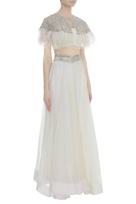 COUTURE BY NIHARIKA White Organza Floral Round Neck Feather Detail Cape Blouse With Lehenga Skirt Online at Aza Fashions COUTURE BY NIHARIKA_White Organza Floral Round Neck Feather Detail Cape Blouse With Lehenga Skirt _Online_at_Aza_Fashions