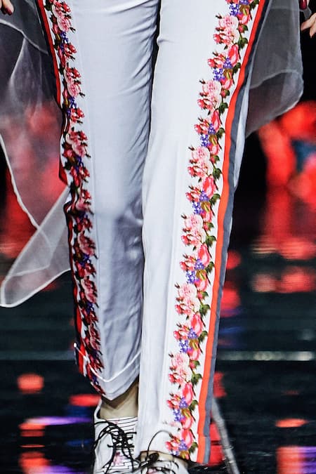 MR. Ajay Kumar_White Printed Side Paneled Floral Pants  _Online_at_Aza_Fashions
