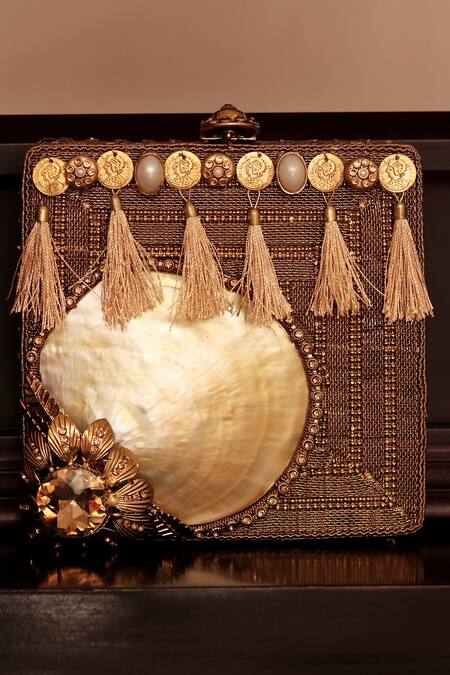 Buy Puneet Gupta Gold Sea Shell Box Shaped Tassel Detail Clutch Online at Aza Fashions Buy_Puneet Gupta_Gold Sea Shell Box Shaped Tassel Detail Clutch_Online_at_Aza_Fashions