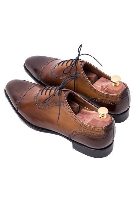 Toramally - Men_Brown European Vegetable Tanned Leather Sole Handpainted Brogue Shoes_Online_at_Aza_Fashions