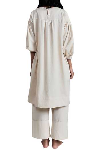 Shop MATI Off White Handloom Cotton Pants at Aza Fashions Shop_MATI_Off White Handloom Cotton Pants_at_Aza_Fashions