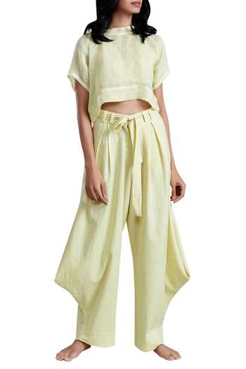 Buy MATI Yellow Handloom Cotton Draped Pants at Aza Fashions Buy_MATI_Yellow Handloom Cotton Draped Pants_at_Aza_Fashions