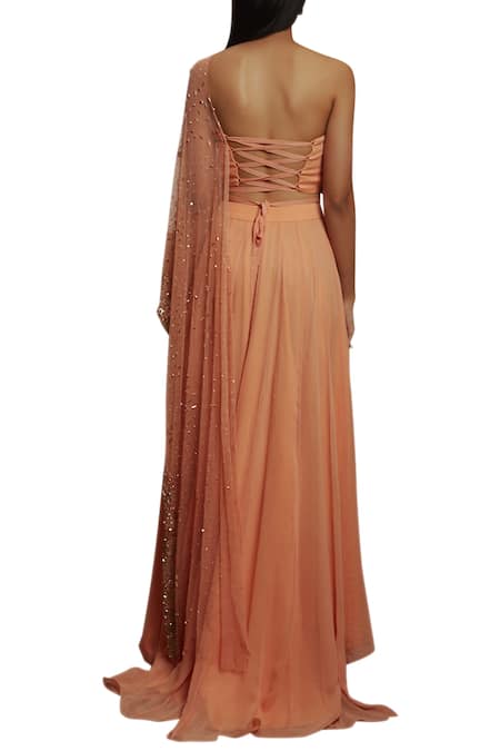 Shop Shloka Khialani Peach Net, Crepe, Georgette One Shoulder Top And Skirt Set at Aza Fashions Shop_Shloka Khialani_Peach Net, Crepe, Georgette One Shoulder Top And Skirt Set _at_Aza_Fashions