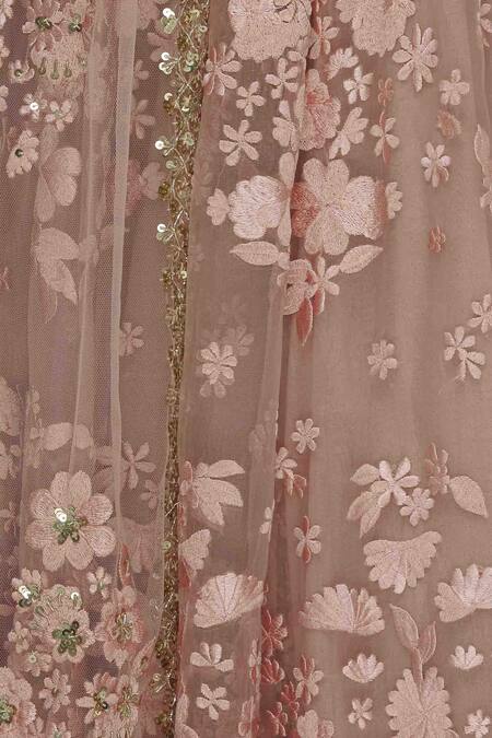 ASTHA NARANG_Pink Net Round Embroidered Lehenga And Cape Set_at_Aza_Fashions