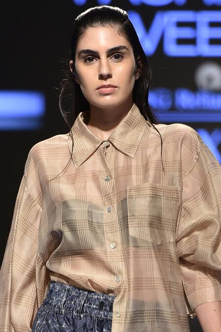 Urvashi Kaur Beige Collared Checkered Asymmetric Bell Sleeve Shirt Online at Aza Fashions Urvashi Kaur_Beige Collared Checkered Asymmetric Bell Sleeve Shirt _Online_at_Aza_Fashions